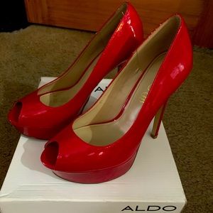 SOLD — Red Aldo peep toed high heels